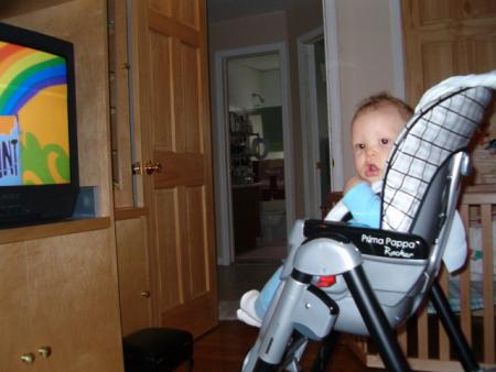 In front of the TV